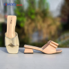 Women’s block heel sandals in cream and peach with elegant bow design from Holy Brand