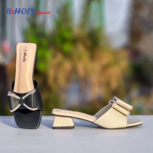 Women’s block heel sandals in cream and peach with elegant bow design from Holy Brand