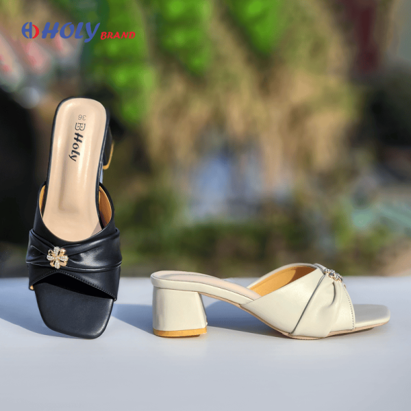 Holy Brand elegant black women’s block heel sandal with flower embellishment
