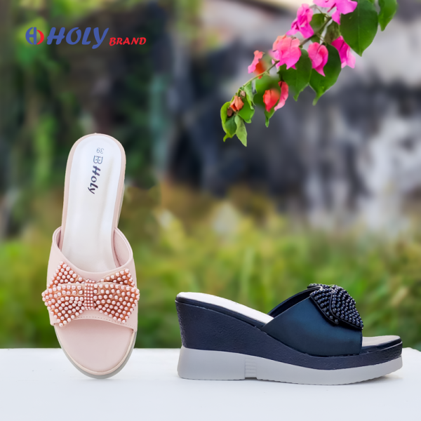 Women’s stylish wedge sandals in pink and black with bow and beaded design from Holy Brand