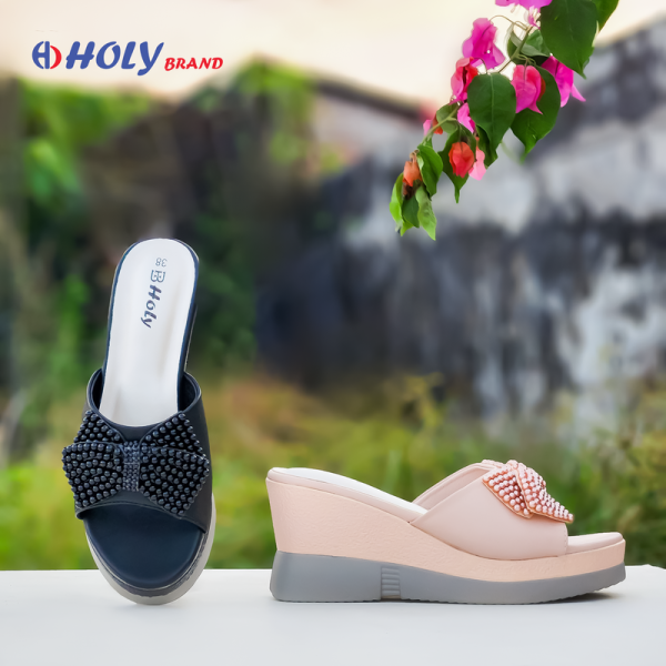 Women’s stylish wedge sandals in pink and black with bow and beaded design from Holy Brand